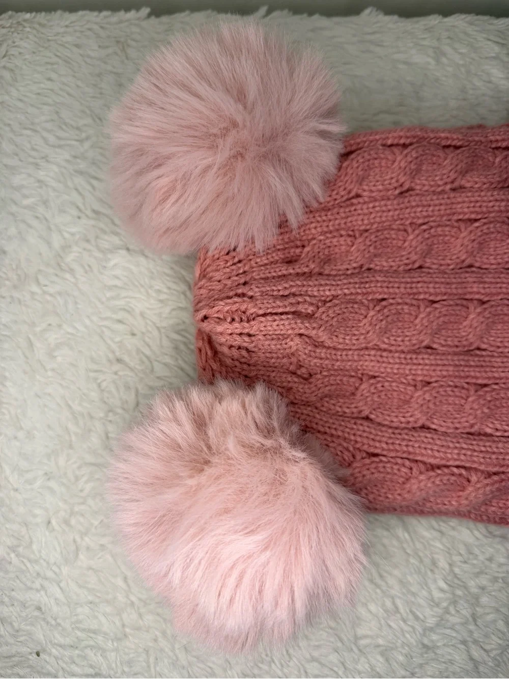 UGG Kids Blush Pink Cable Knit Hat with Dual Faux-Fur Poms